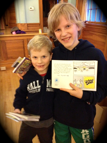 Vermont's youngest librarians, showing off their newest acquisition, Jarrett J. Krosoczka's Lunch Lady and the Schoolwide Scuffle.